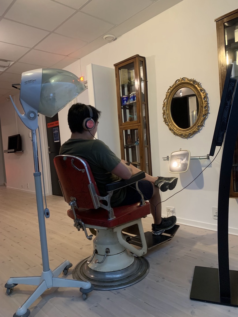 someone testing in a listening chair