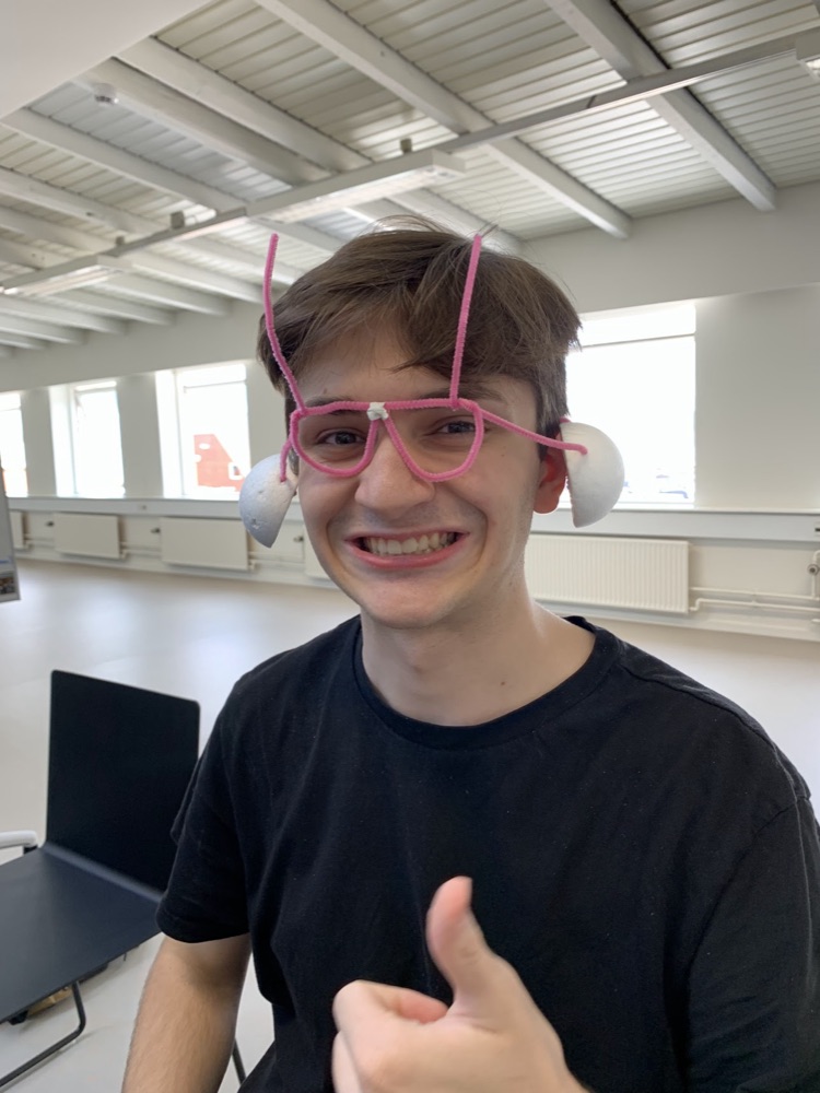 wearing a pipe cleaner and foam headphone mockup